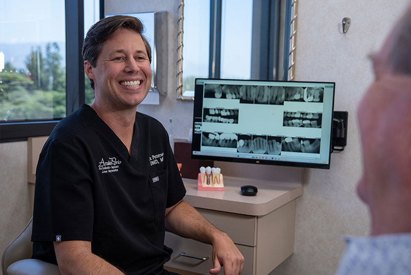 Dentist Consulting with a Paitent