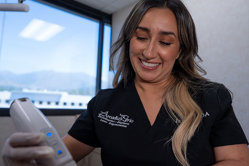 Team member Taking a 3d scan of Patients Teeth