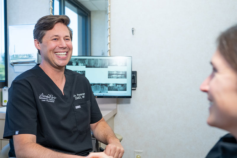 Dentist shaking Patient's Hand