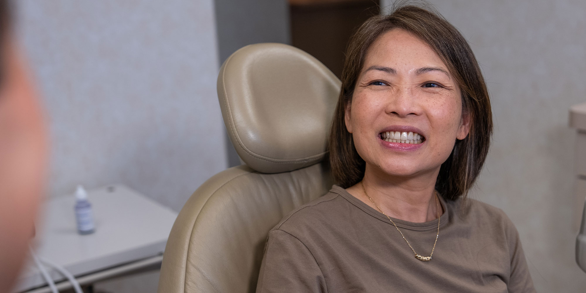 Paitent smiling at Dentist