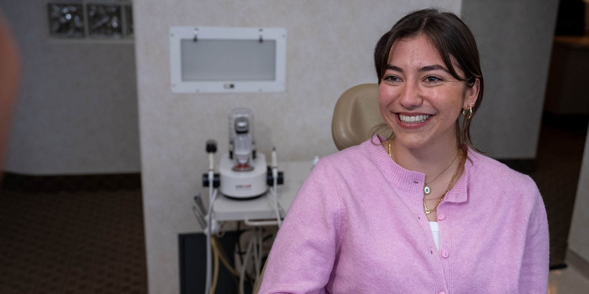 Paitent Smiling at Dentist shaking his hand