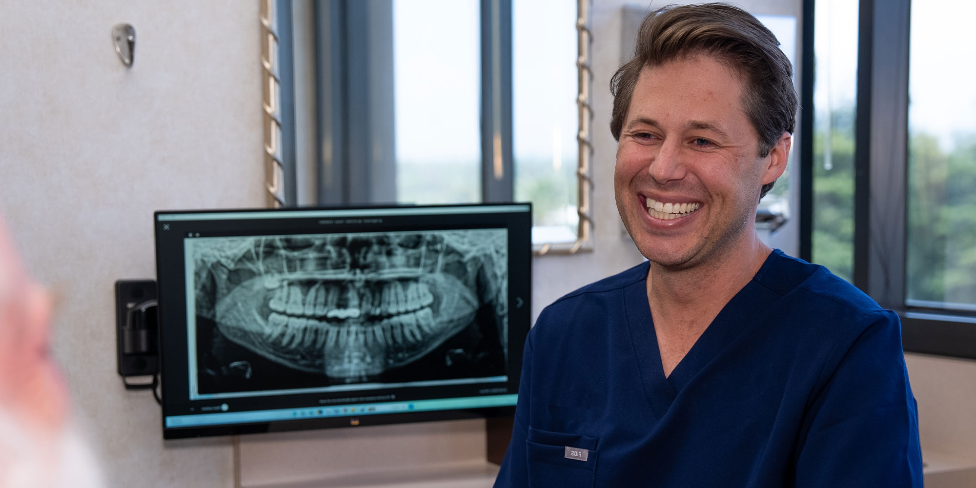Dentist Consulting with Paitent