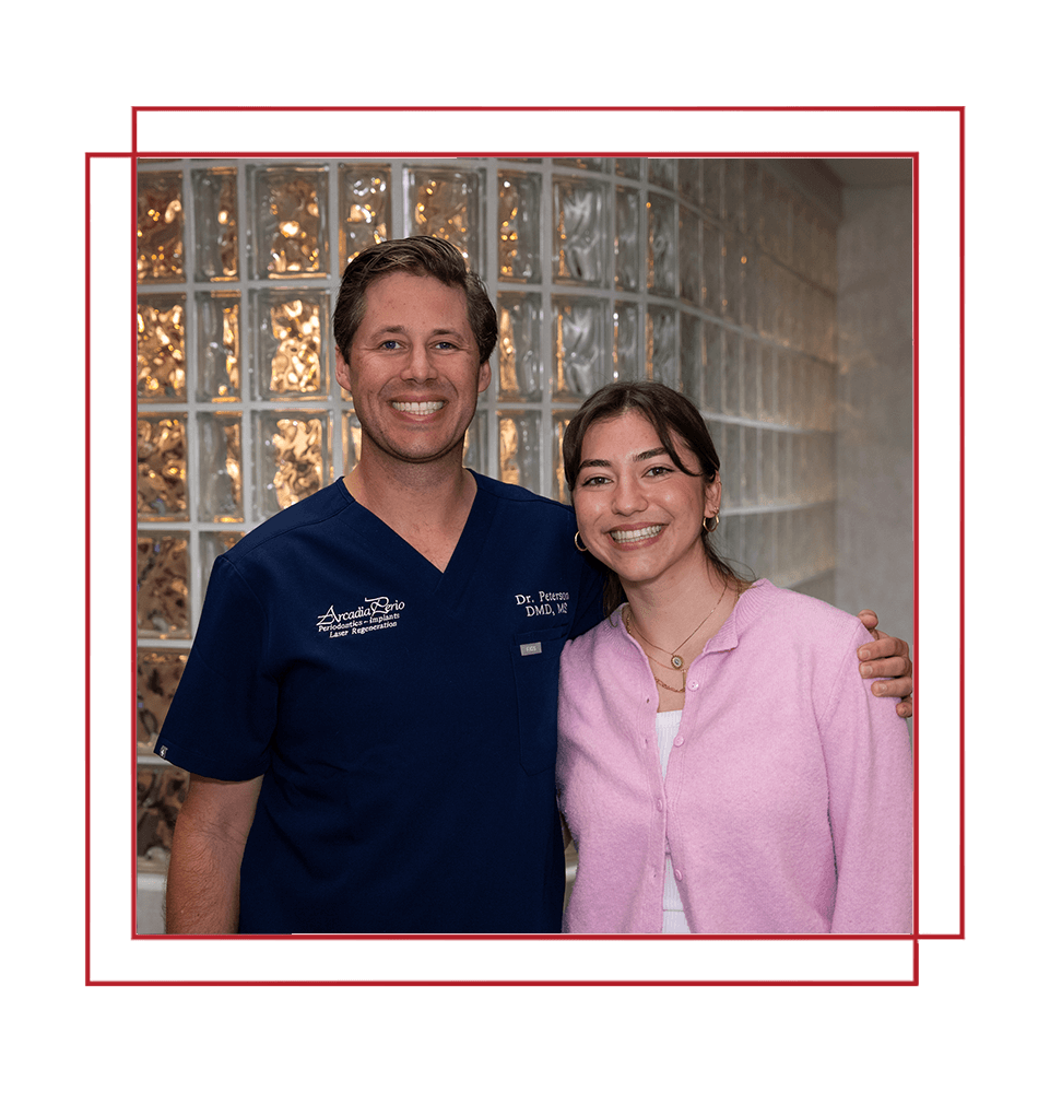doctor and patient both smiling brightly after patient's dental procedure