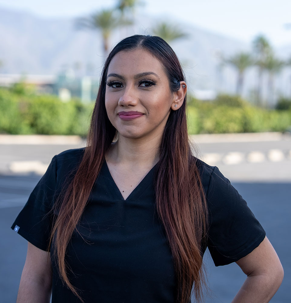 headshot of staff member outside of the dental practice