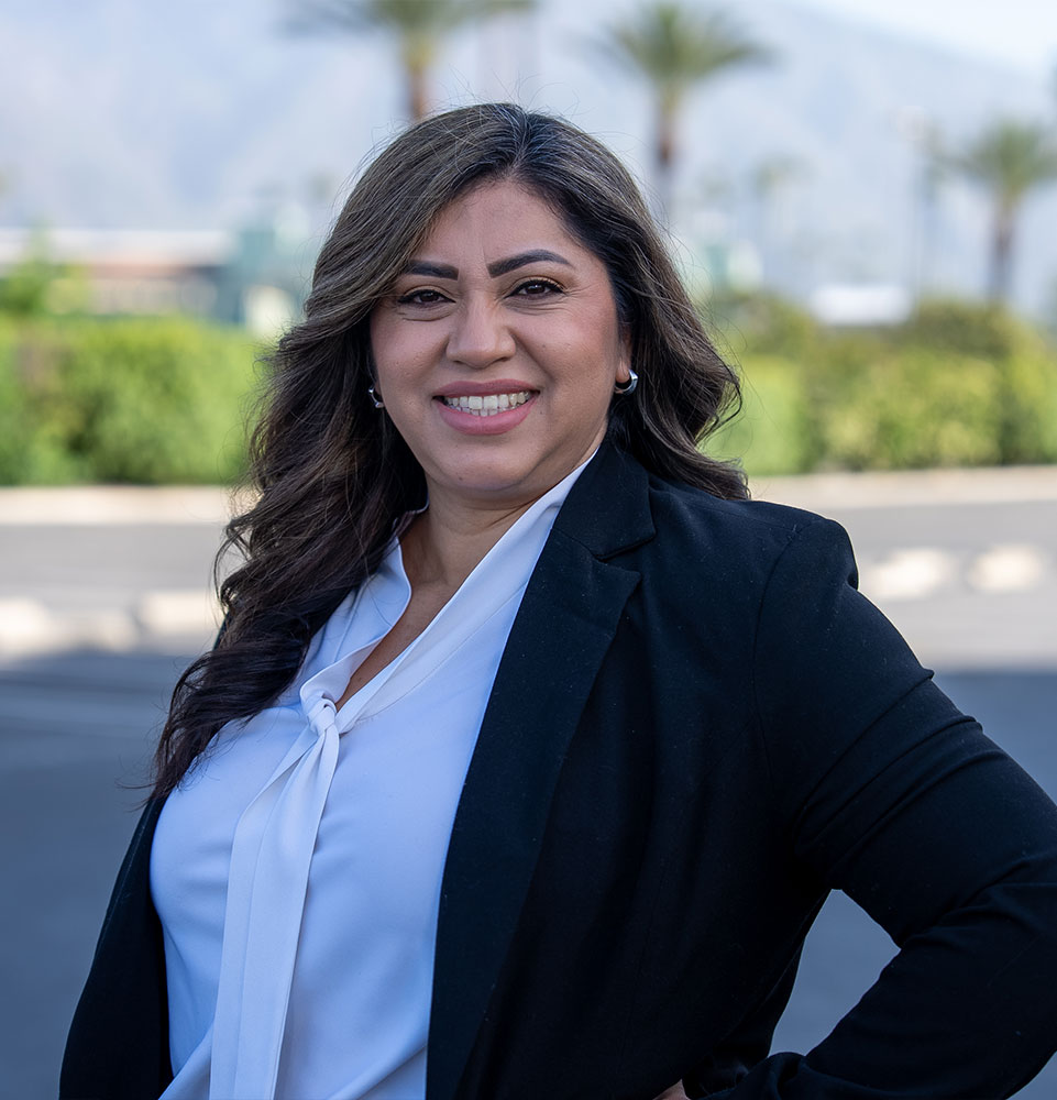 headshot of staff member outside of the dental practice