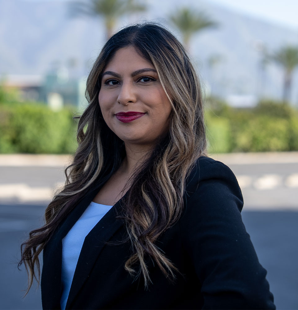 headshot of staff member outside of the dental practice